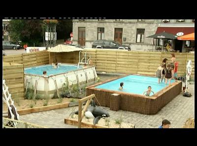 TRANSFORMATION DE LA PLACE DE CINEY EN PLAGE EN JUILLET